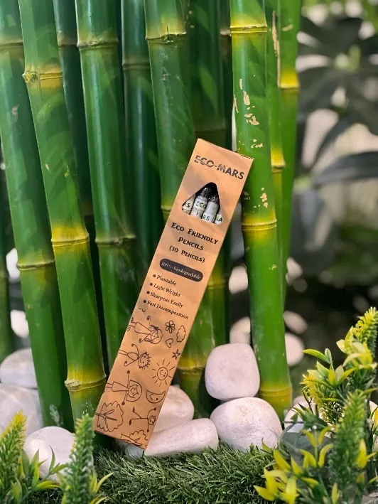 Eco-Mars seed pencil packaging in a green setting